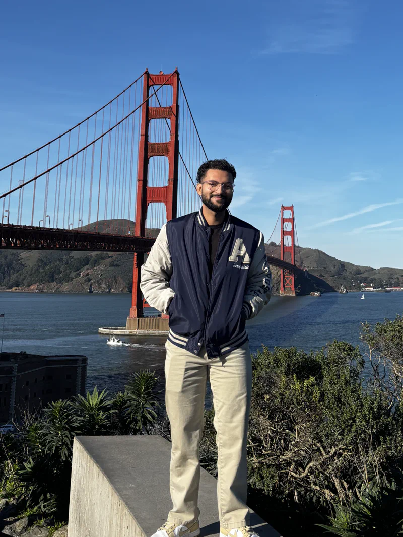 Sean P. Florez standing in front of the Golden Gate Bridge